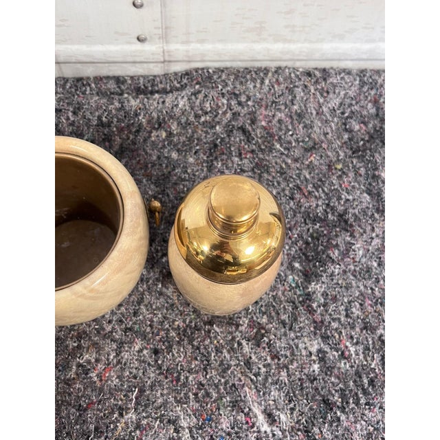 Tabletop set consisting of a champagne bucket, ice bucket, and shaker. Made by Macabo in the 1960s (brand name on the...