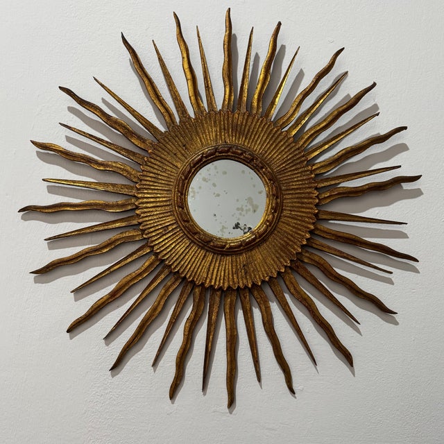 Magnificent Sun Mirror known as Witch's Mirror in gilded wood