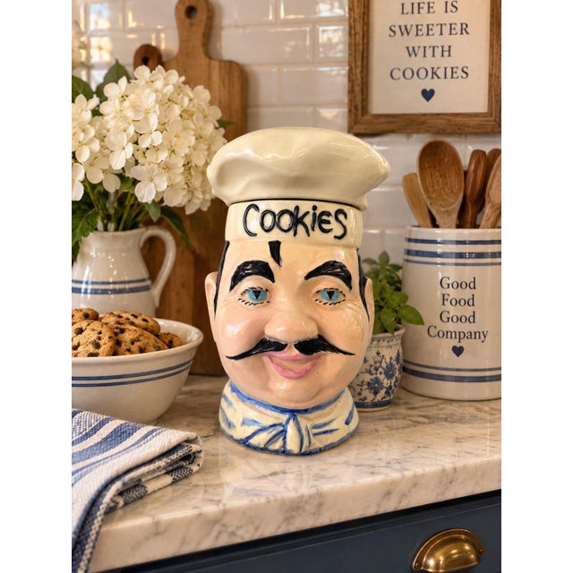 Charming vintage McCoy Pottery figural Chef cookie jar, circa 1960s, featuring a jovial chef with expressive blue eyes,...
