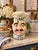 Charming vintage McCoy Pottery figural Chef cookie jar, circa 1960s, featuring a jovial chef with expressive blue eyes,...
