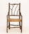 Adirondack Style Rustic Twig and Branch Arm Chair, with woven natural fiber seat. 40" H x 21.5" W x 17" D; seat: 17" H....