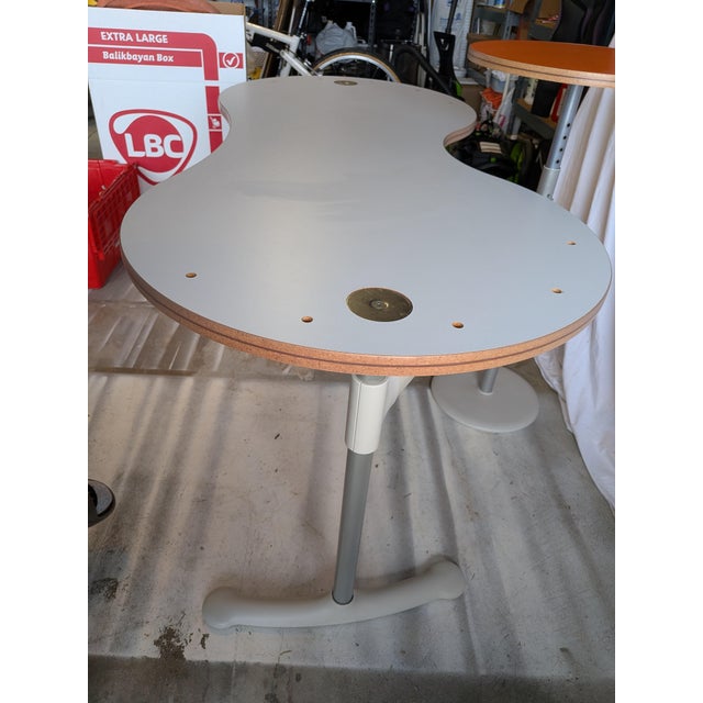 The Red Rocket desk is an iconic, "space age" postmodern desk designed by Ayse Birsel for Herman Miller in 2000, known for...