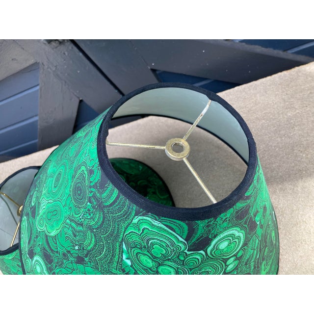 A pair of lampshades handmade from a malachite green printed cotton, washer top measurements, top 5” side 8.5 bottom 14”