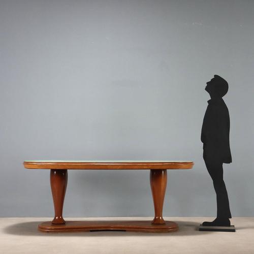 Table with double-legged base turned in solid beech wood and larch veneer, features a wooden top with recessed back-...