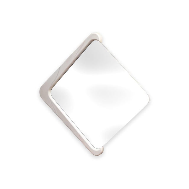 A matching console table and wall hanging mirror. This set features a 1970s Karl Springer inspired style design, with its...
