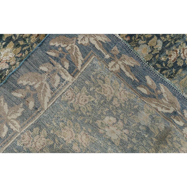 This exquisite Turkish Hereke rug reflects the renowned artistry and refinement of the Ottoman weaving tradition....