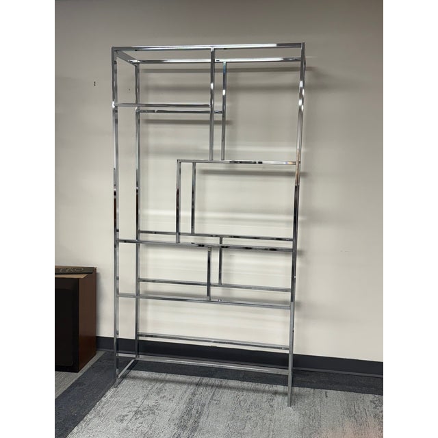 -MANUFACTURE: Manner of Milo Baughman -IN THE STYLE OF: Mid-Century -DATE OF MANUFACTURE: 1970's -MATERIALS SHELVES: Glass...