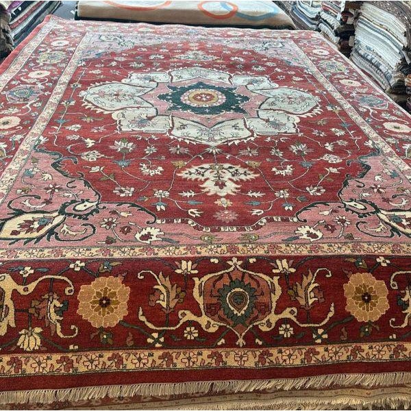 This contemporary Turkish rug offers a fresh and elegant interpretation of the classic Serapi design, reimagined with a...