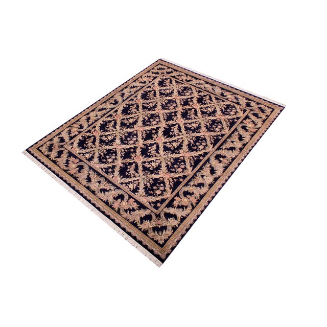 Designed with mesmerizing intricacy and gorgeous color palette, this hand-knotted masterpiece demonstrates the beauty and...