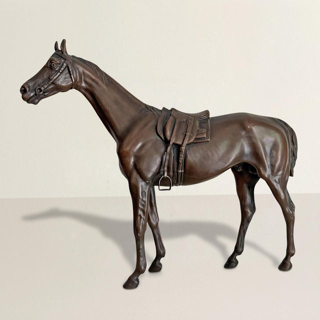 This American cast bronze thoroughbred stands exactly as every great racehorse should: collected, disciplined, muscles...
