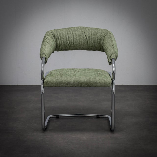 A stylish set of 6 dining chairs designed by giotto stoppino for kartell during the 1970s. The combination of soft...