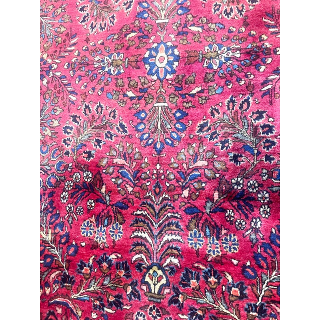 This attractive antique Persian Sarouk rug, woven around 1920, is a fine example of one of Persia's most celebrated...