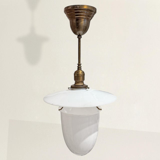 This is the kind of lighting that stops the conversation. An exceedingly rare early-19th-century American pendant, it...
