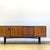A distinguished work of mid-century british design, this g plan sideboard from the celebrated brasilia collection was...
