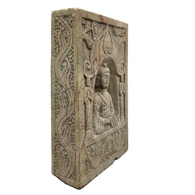 A Chinese antique carved stone wall plaque with traces of original polymorphic and nice patina. Crafted in China, this...
