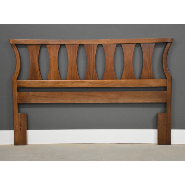 A mid century modern walnut queen or full size headboard. Professionally restored. Made in USA. Circa 1960’s. 60” wide....