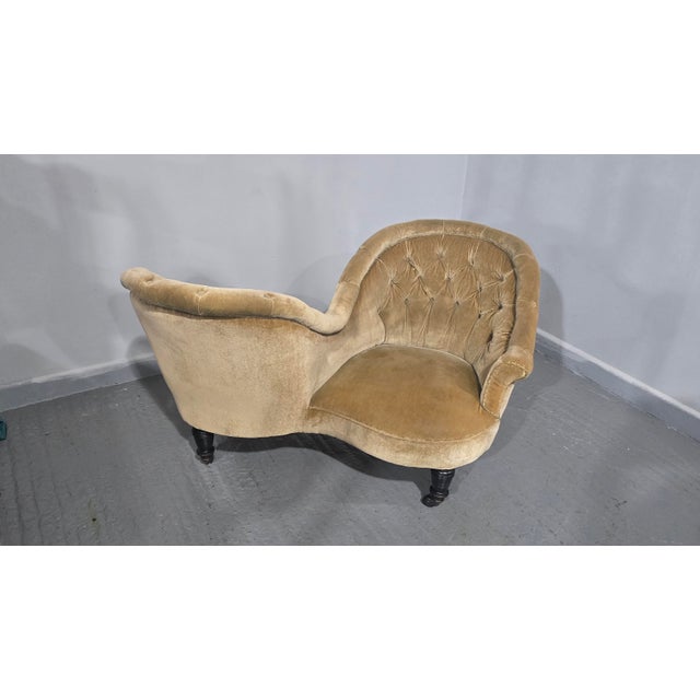 A very good Victorian two seat conversation sofa, ebony turned legs, brown pot castors, dark beige deep buttoned plush...
