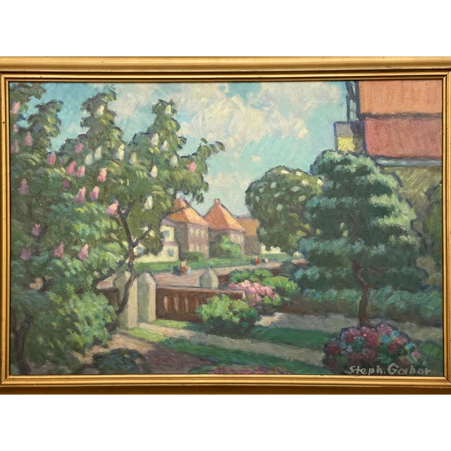 This vintage, oil on board, signed Steph. Gabor depicts a lush city garden on a quiet street. The paint has been applied...