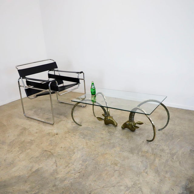 Circa 1960. We offer this Pair of Brass Ibex Rams Heads in the Style of Alain Chervet. In order to ensure shipping and...