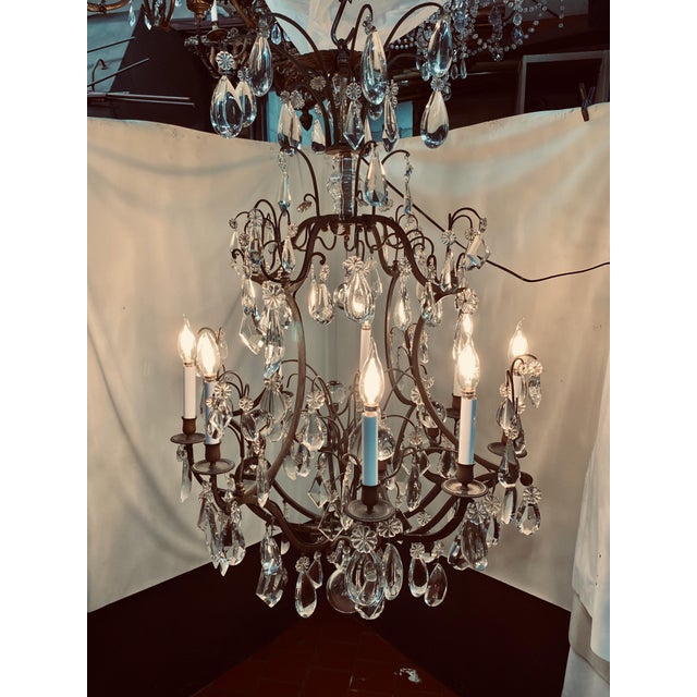 Heavy lead crystal Chandelier, just rewired and refreshed here in the USA. The amazing French piece has been authenticated...