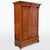 A stately two-door wardrobe from the Historicist period, made around 1880. The main visual features include richly carved...