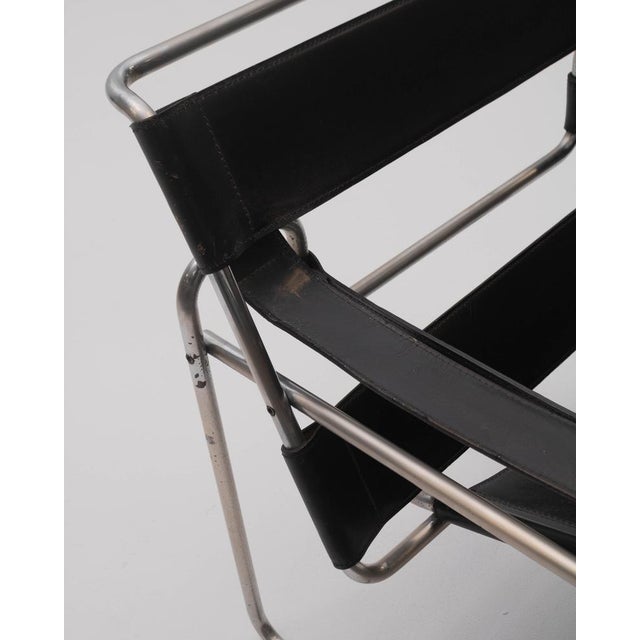 This Bauhaus-style chair, designed by Marcel Breuer between 1925 and 1926, is considered the first chair in history made...