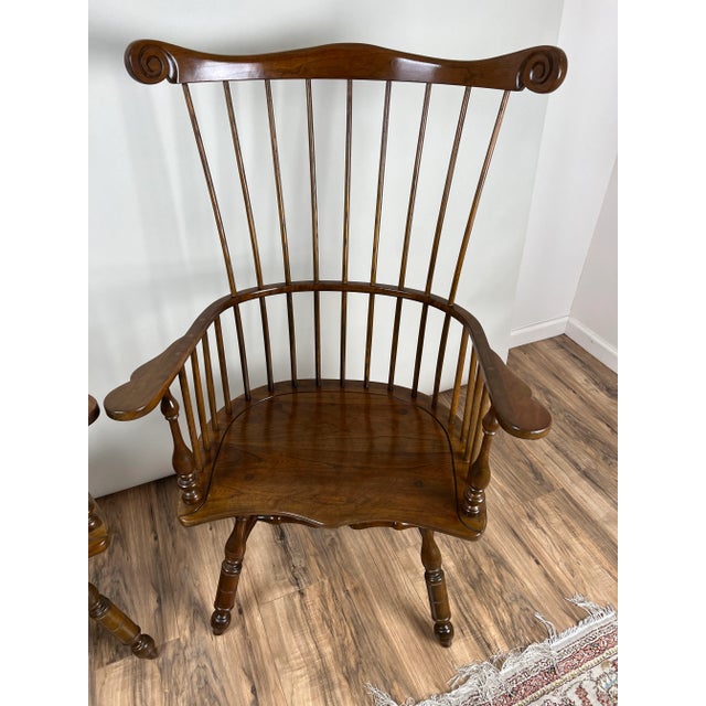 This pair of vintage Stickley Windsor chairs, crafted in cherry, represents the enduring quality and timeless style for...