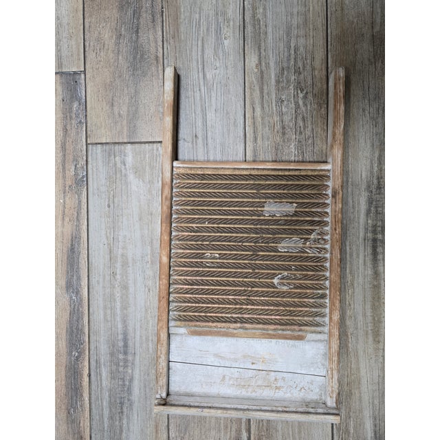 A stellar example of mid-20th-century primitive American utility ware manufactured by Howard Woodenware. This rustic...