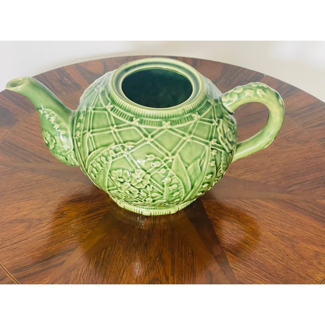 Tiffany & Co Green Majolica tea pot with Lilly of the valley flowers. No cover.