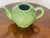 Tiffany & Co Green Majolica tea pot with Lilly of the valley flowers. No cover.