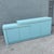 A striking Postmodern credenza showcasing clean geometric forms softened by rounded corners and finished in a refreshing...
