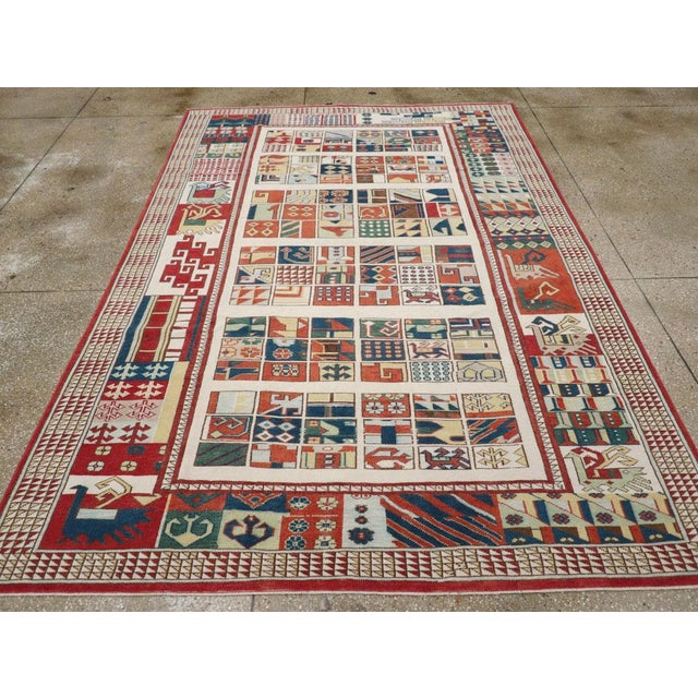 A vintage Turkish Anatolian accent rug handmade during the Mid-20th century. Measures: 6' 9" x 9' 11"