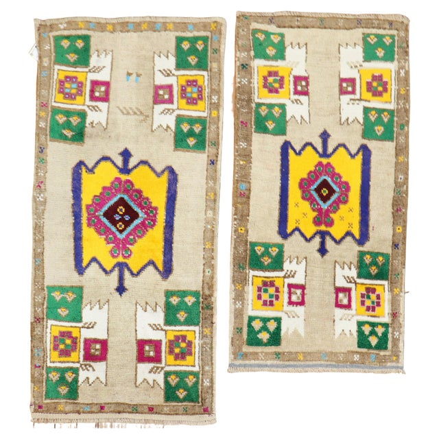 Pair of late 20th century Turkish rugs Measures: 1'6'' x 2'11'' & 1'7'' x 3'4''.