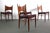 Rich grained walnut chairs with gorgeous plum colored suede upholstery