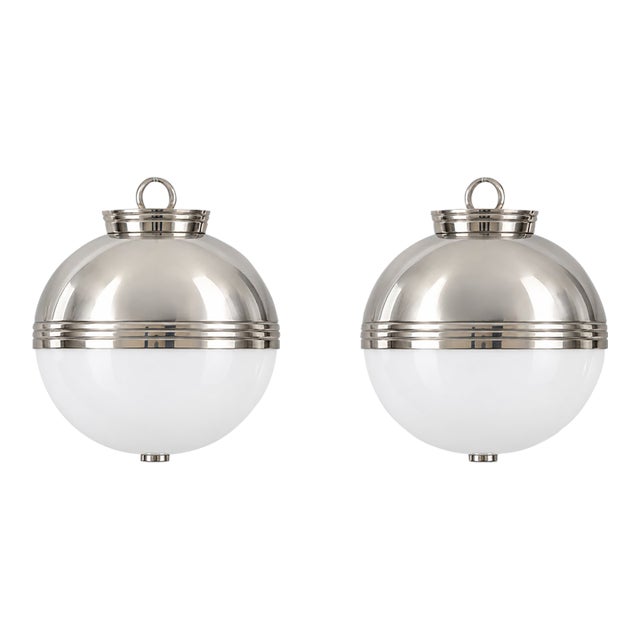Pair of Ralph Lauren Polished Silver and White Globe Pendants For Sale