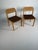 Original pair of Danish dining chairs designed by Henning Kjærnulf and manufactured by Vejle Møbelfabrik in Denmark....