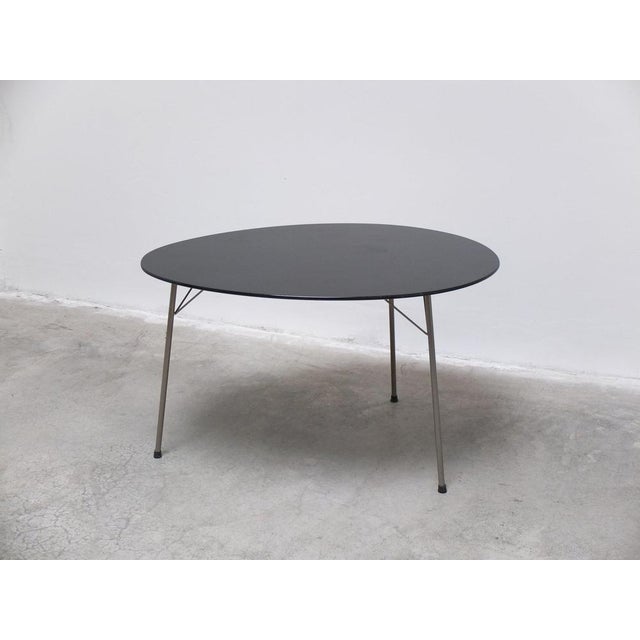 A rare and beautiful ‘Egg’ table designed by Arne Jacobsen in 1952. Very early black lacquered version from the 1950s....