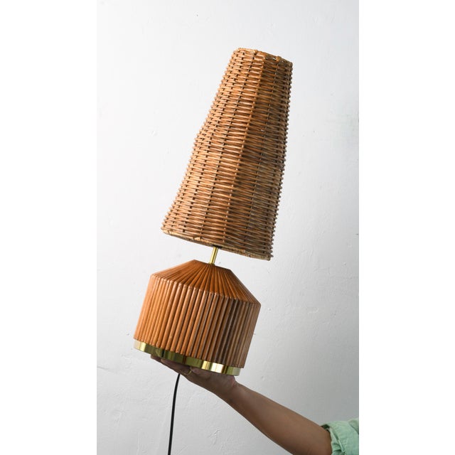 Classic &nbsp;Mid-century Modern Style rattan table lamp. The base is meticulously handcrafted to acieve beautiful lines...