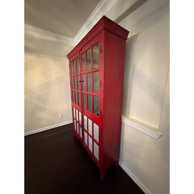 Crate & Barrel Rojo Cabinet. Tissue paper is currently on the back of the lower glass doors, but that can easily be...