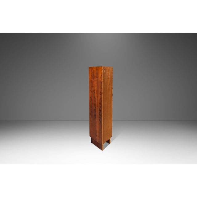 Introducing a tall, freestanding bookshelf attributed to Ejvind Johansson for Ivan Gern Møbelfabrik. Once a part of a...