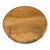 A round mahogany coffee table by Heritage with a broad figured top, contrasting perimeter band and four tapered legs. A...