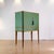 Beautifully crafted in Sweden in 1940s by Ferdinand Lundquist this cabinet really stands out. Later renovated and covered...