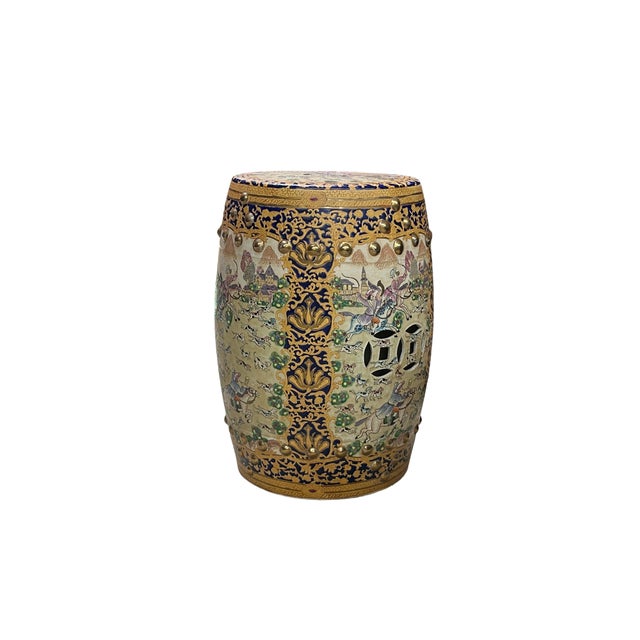 This ornate ceramic garden stool is a striking example of Chinoiserie-style craftsmanship, featuring a traditional barrel...