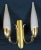 Angelo Lelli for the famous italian editor Arredoluce, pair of double sconces, in brass with frozen white glass, and...