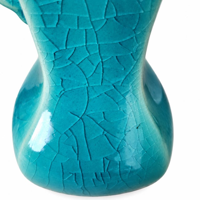 This exquisite ceramic vase, crafted by the renowned Japanese brand Heian Rakuzan, presents a captivating example of...