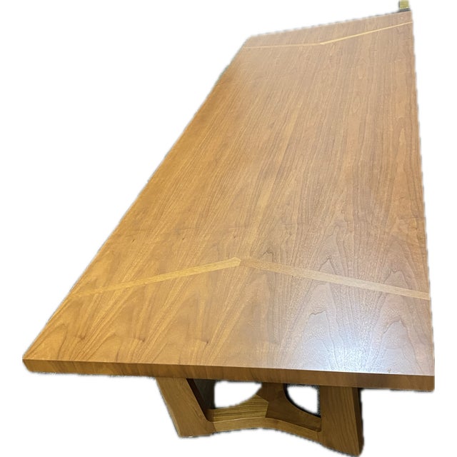 Holly Hunt Trice Dining Table with sculptural double pedestal base and a beautiful three way miter center detail. Seats 8...