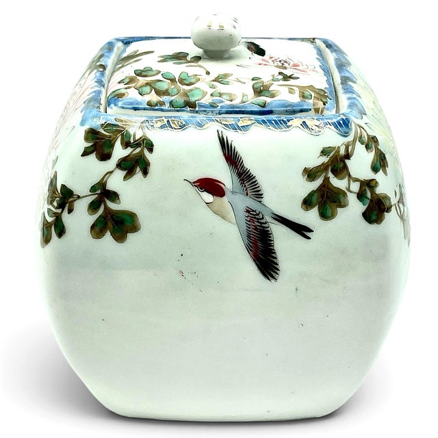 One square, bulbous light Celadon porcelain jar covered in polychrome enamel (resembling Wucai or late-style Asian ceramic...