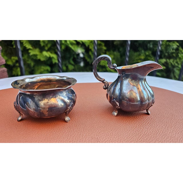 Art Deco silver-plated creamer, sugar bowl, and tray; marked "Victoria 60", dimensions: tray – width 23 cm, depth 14 cm,...