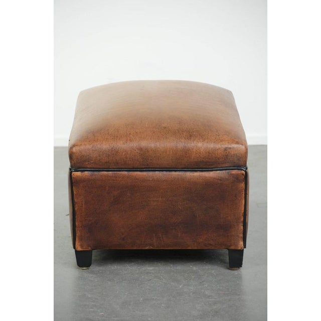 Sheepskin Ottoman with Black Piping For Sale - Image 5 of 9