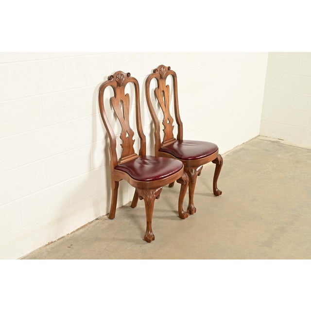 An outstanding pair of Georgian, Chippendale, or Queen Anne style side chairs or dining chairs By Kittinger, "Colonial...